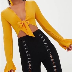 Mustard tie front frill sleeve blouse